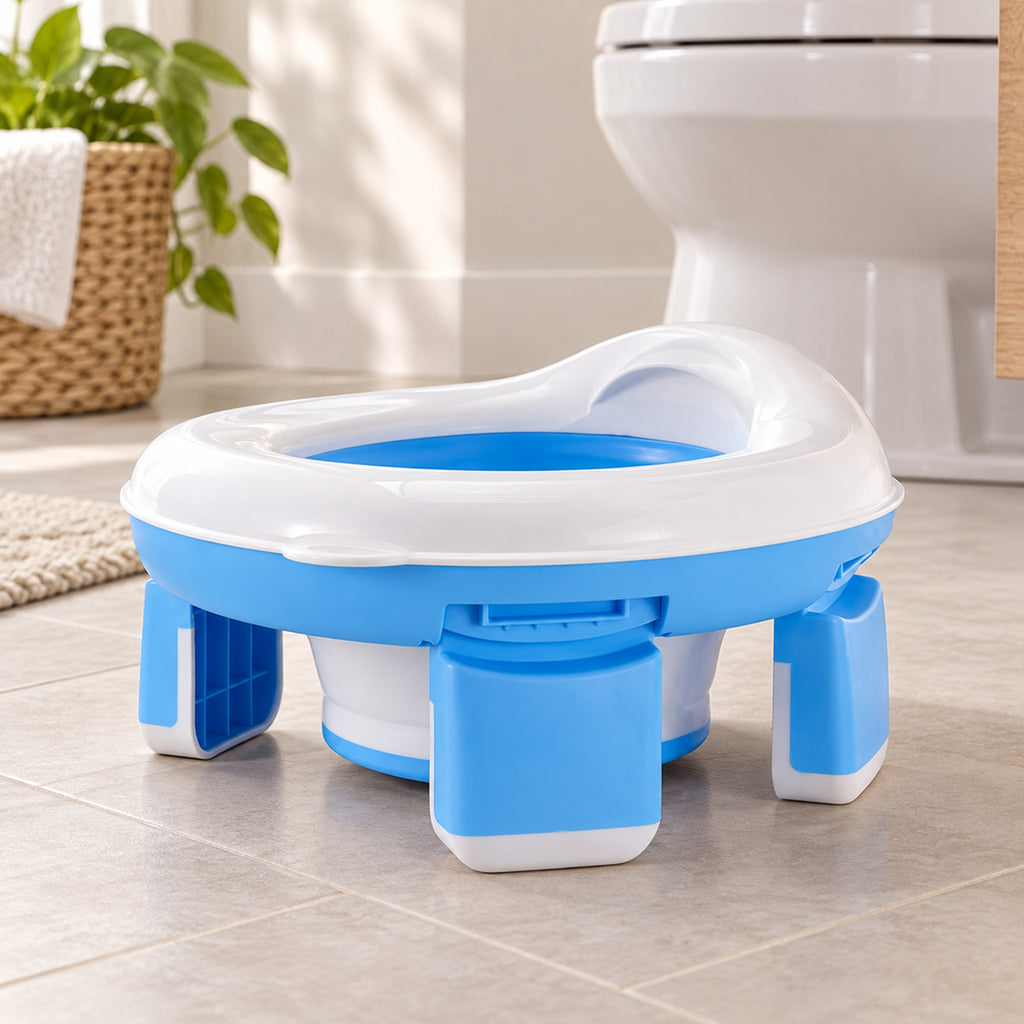 Lumiwee 2-in-1 Travel Potty & Toilet Training Seat: blue travel potty open on bathroom tile beside a toilet