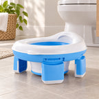 Lumiwee 2-in-1 Travel Potty & Toilet Training Seat: blue travel potty open on bathroom tile beside a toilet