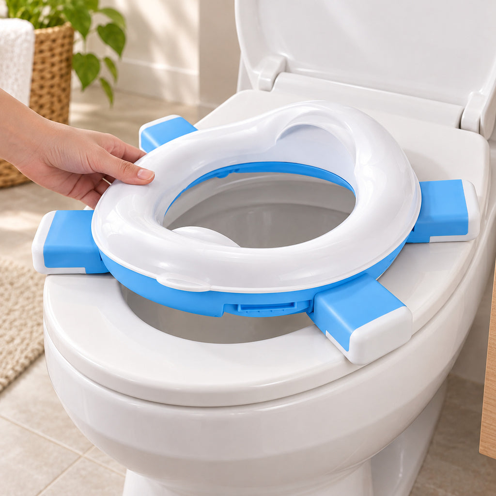 Lumiwee 2-in-1 Travel Potty & Toilet Training Seat: adult hand fitting the blue training seat onto a toilet