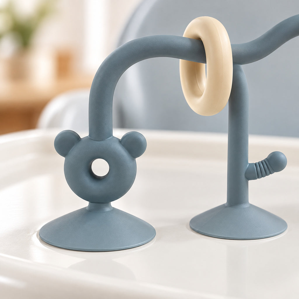 Lumiwee Abacus Suction Cup Toy for High Chairs: close-up of a bear-face suction foot and cream sliding ring