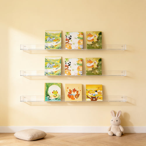 Lumiwee Aspen wall-mounted picture book shelf: three clear book ledges holding picture books on a nursery wall
