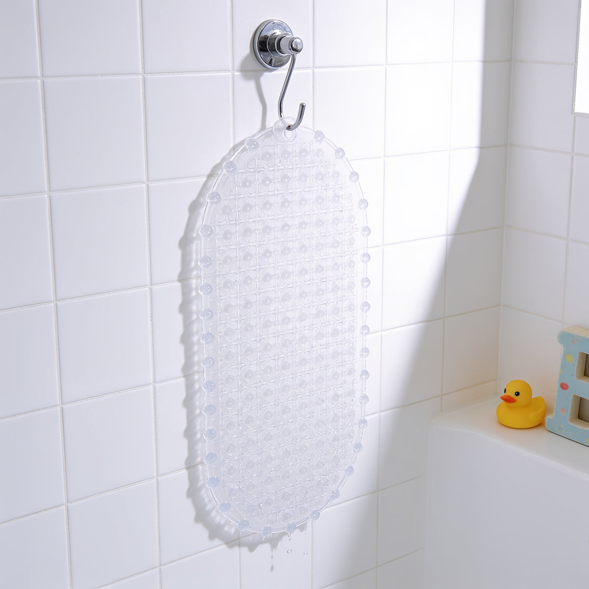 Lumiwee Brook kids suction-cup shower mat: the mat hanging on a hook to dry