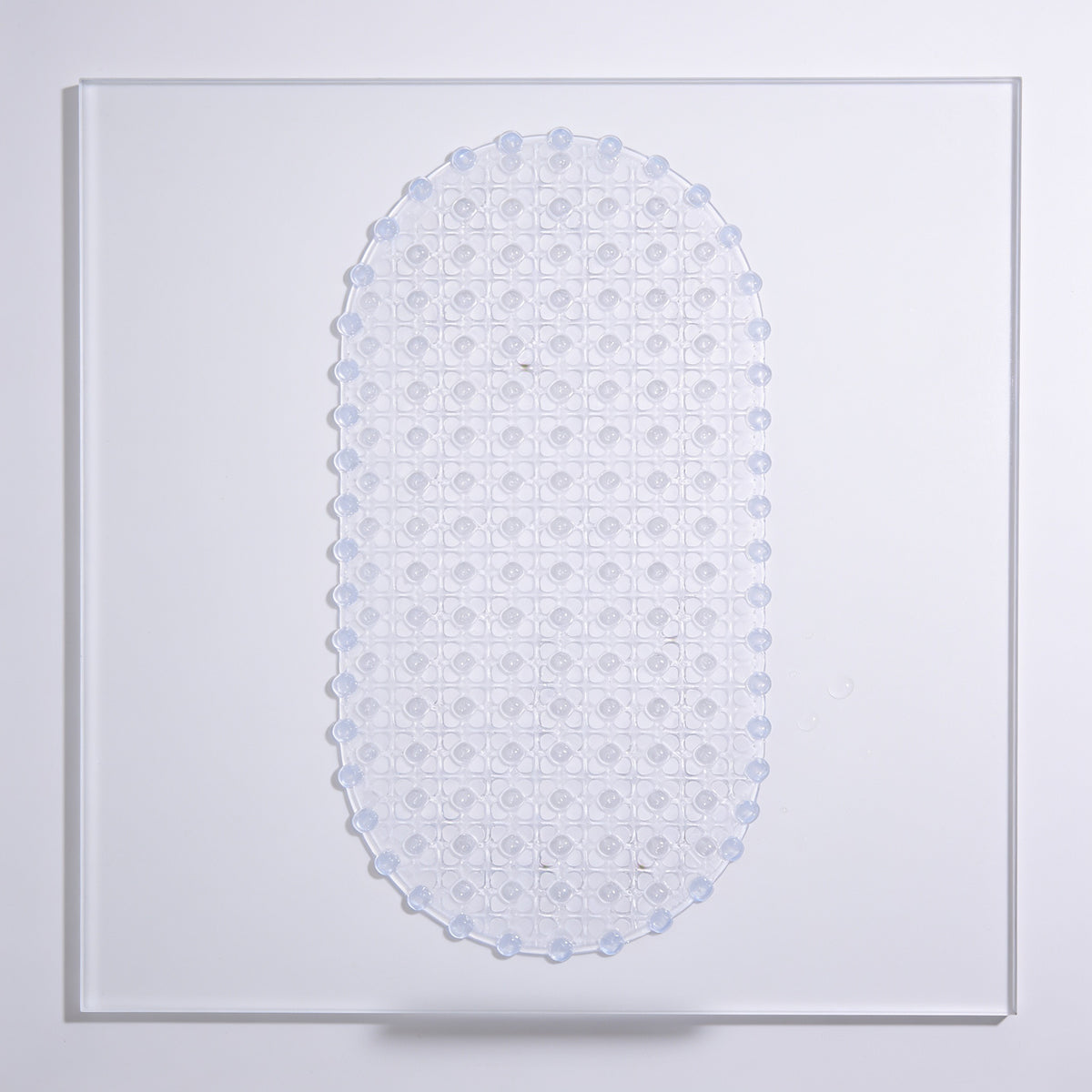 Lumiwee Brook kids suction-cup shower mat: clear oval shower mat on a white background