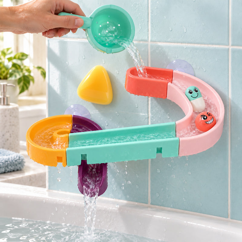 Lumiwee Cascade Water Track Bath Toy Set: adult hand pouring water from the mint scoop into the wall-mounted track