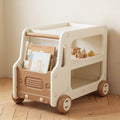 Lumiwee Cedar truck toy and book cart: brown truck-shaped book and toy cart in a playroom