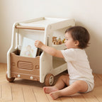 Lumiwee Cedar truck toy and book cart: toddler pulling a book from the front pocket