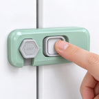 Close-up of the slide button and rotating catch on the Lumiwee fridge lock