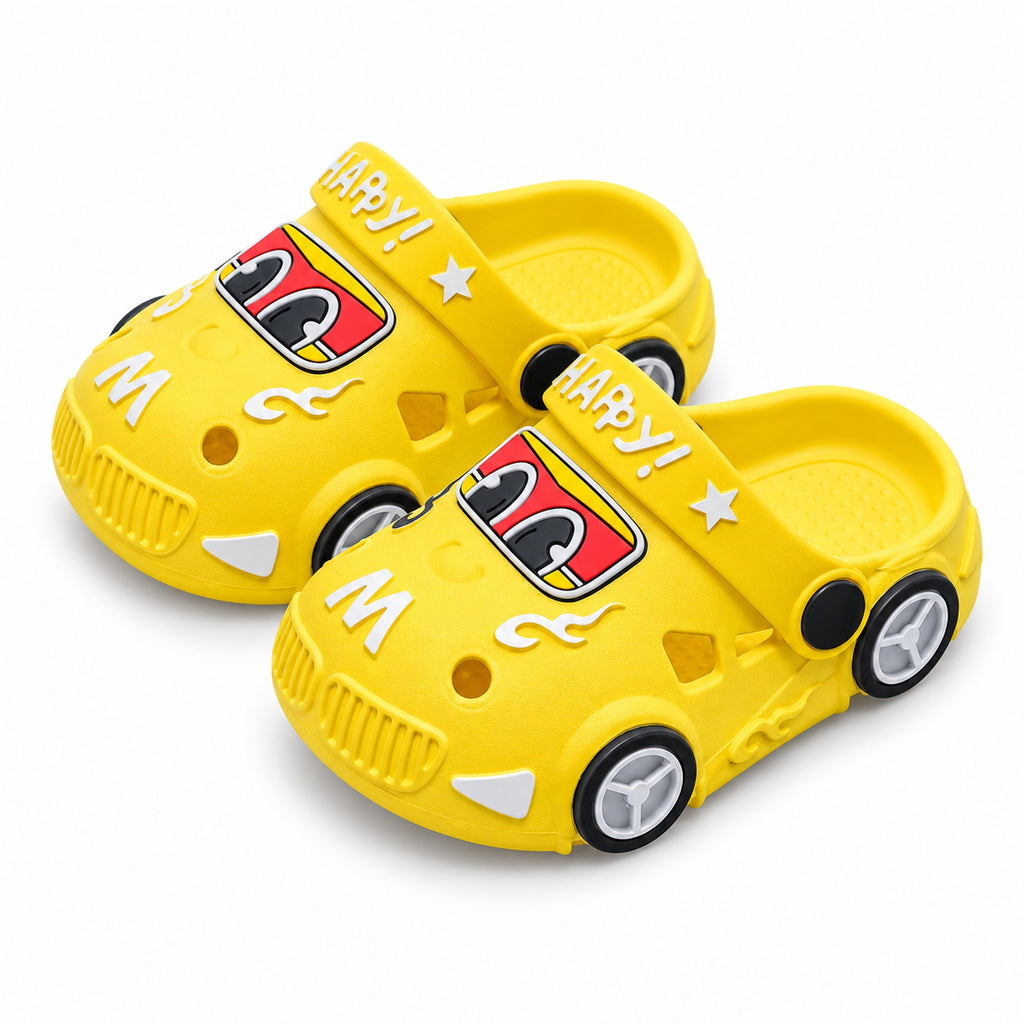 Pair of yellow Lumiwee light-up toddler car clogs on a white background