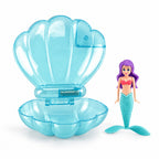 Clear-blue Lumiwee seashell dive toy with mermaid on a white background