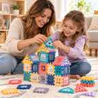Parent and child adding a roof piece to a colorful Lumiwee block cottage