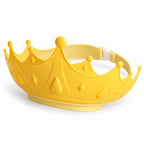 Yellow Lumiwee crown bath visor with adjustable buckle on a white background