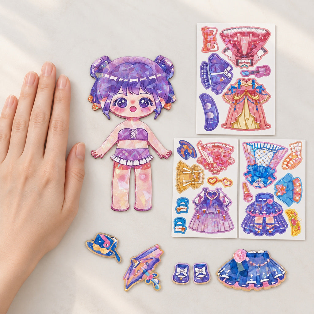 Purple-haired Lumiwee magnetic doll and outfit sheets beside an adult hand for scale