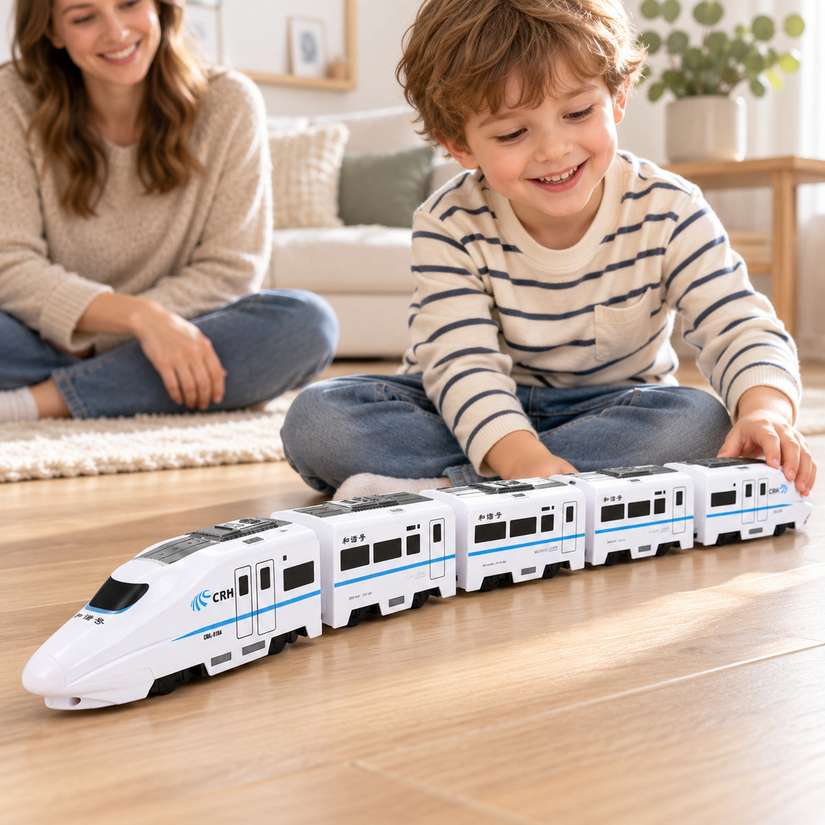 Child playing with the five-car Lumiwee Dash bullet toy train beside a supervising parent