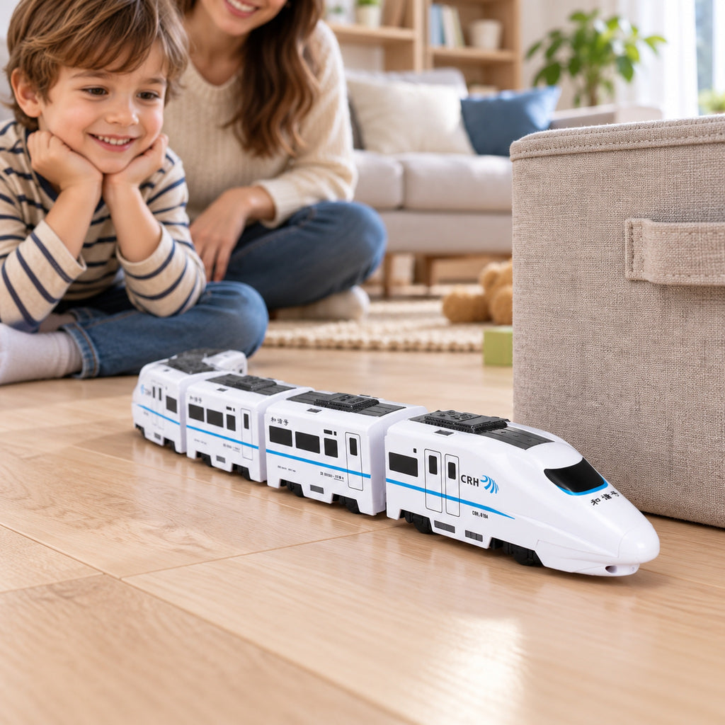 Four-car Lumiwee Dash bullet toy train turning beside a soft obstacle during supervised play