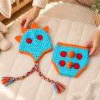 Parent arranging the Lumiwee dinosaur crochet photo props on a padded floor mat