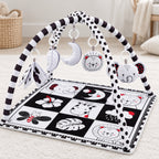 Lumiwee Domino hanging cloth book and four soft rattles