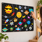 Lumiwee Fable Felt Board: adult presses the Earth piece onto the board