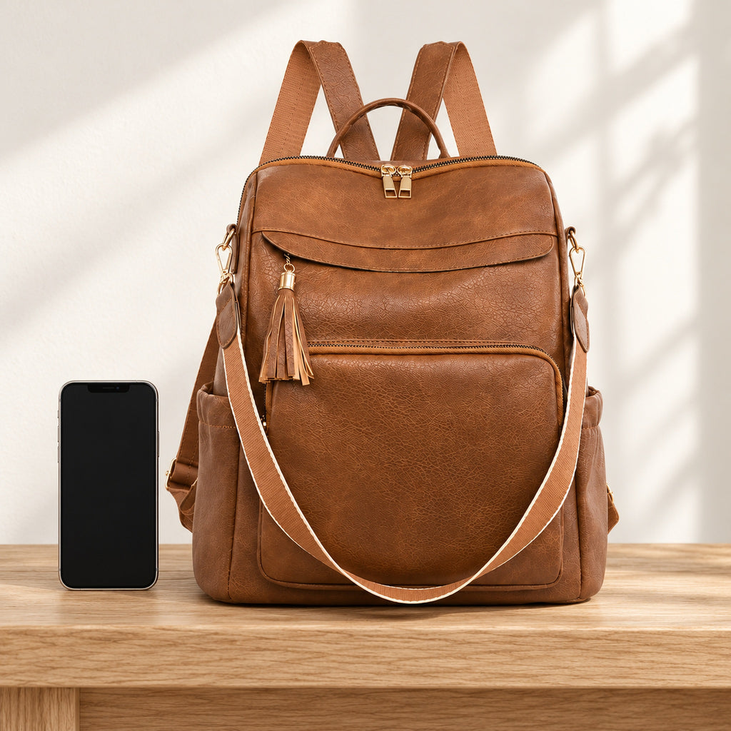 Lumiwee Finch Vegan Leather Backpack Purse: brown bag beside a smartphone for scale