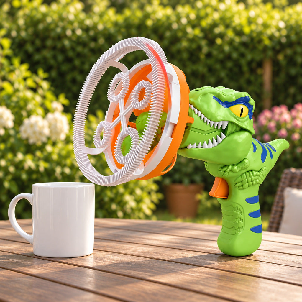 Lumiwee green Fizz dinosaur bubble gun beside a white mug for scale