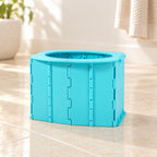 Lumiwee Sky Blue foldable potty on clean bathroom tile