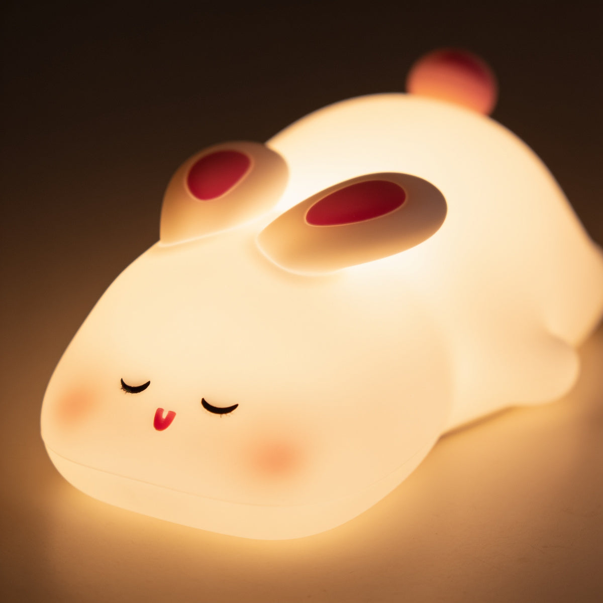 Lumiwee Glow animal silicone night light: close-up of the soft silicone bunny face and ears