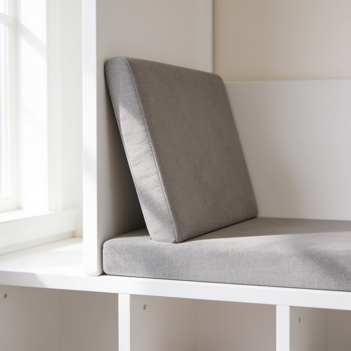 Lumiwee Hazel white kids bookcase with reading nook: close-up of the grey bench cushion and angled backrest