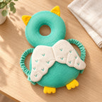 Lumiwee Owl cushion on a light oak table