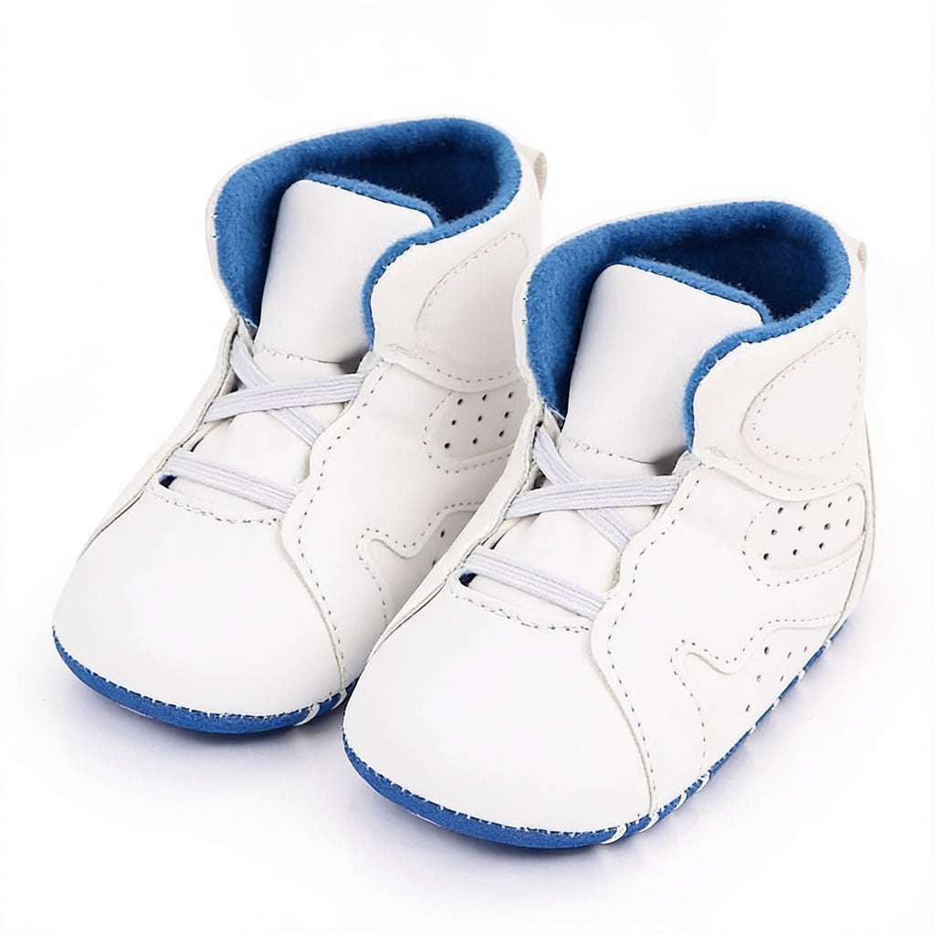 Lumiwee Kick soft-sole baby sneakers: pair of white and blue baby sneakers on a white background