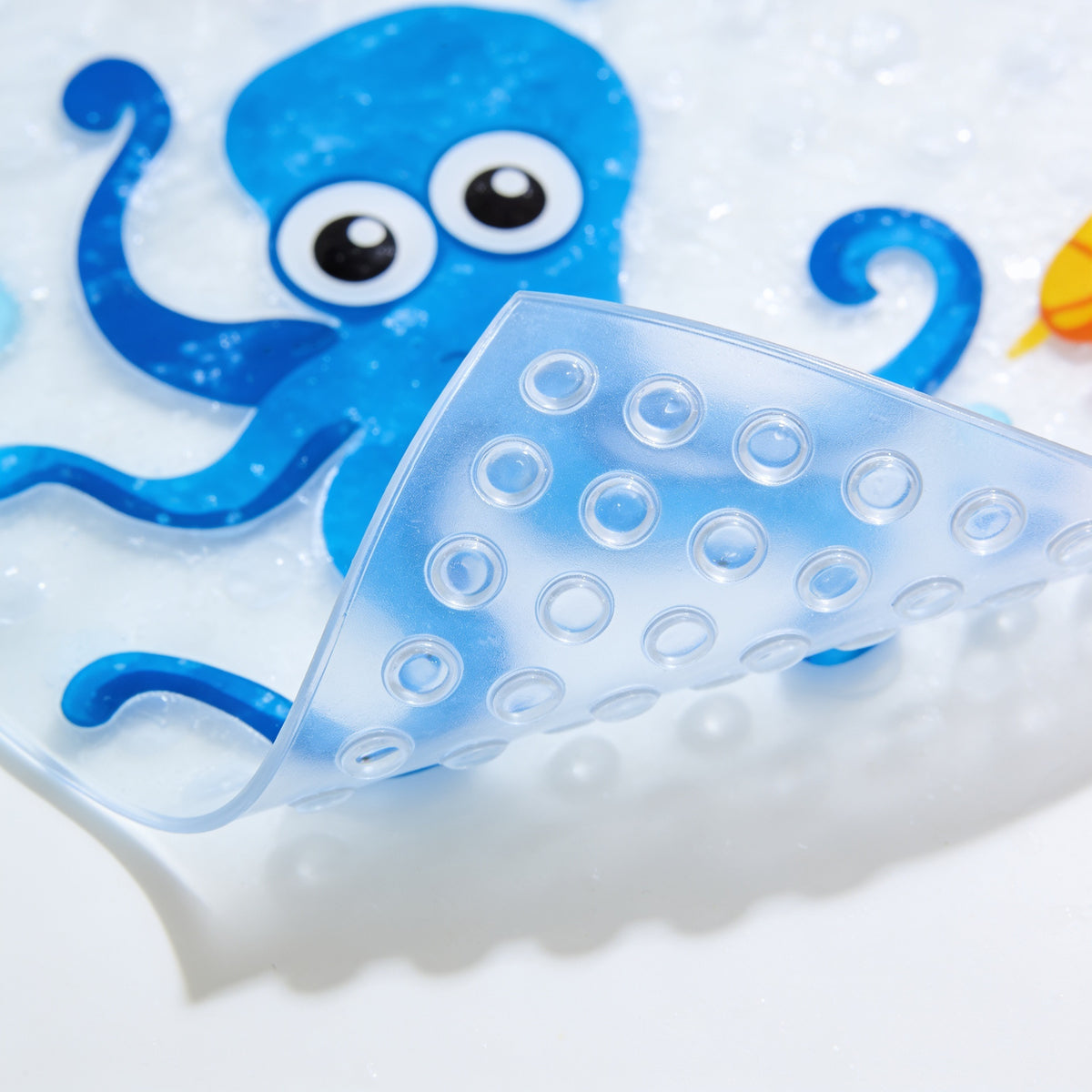 Lumiwee Lagoon kids bath mat: close-up of the textured top and suction cups