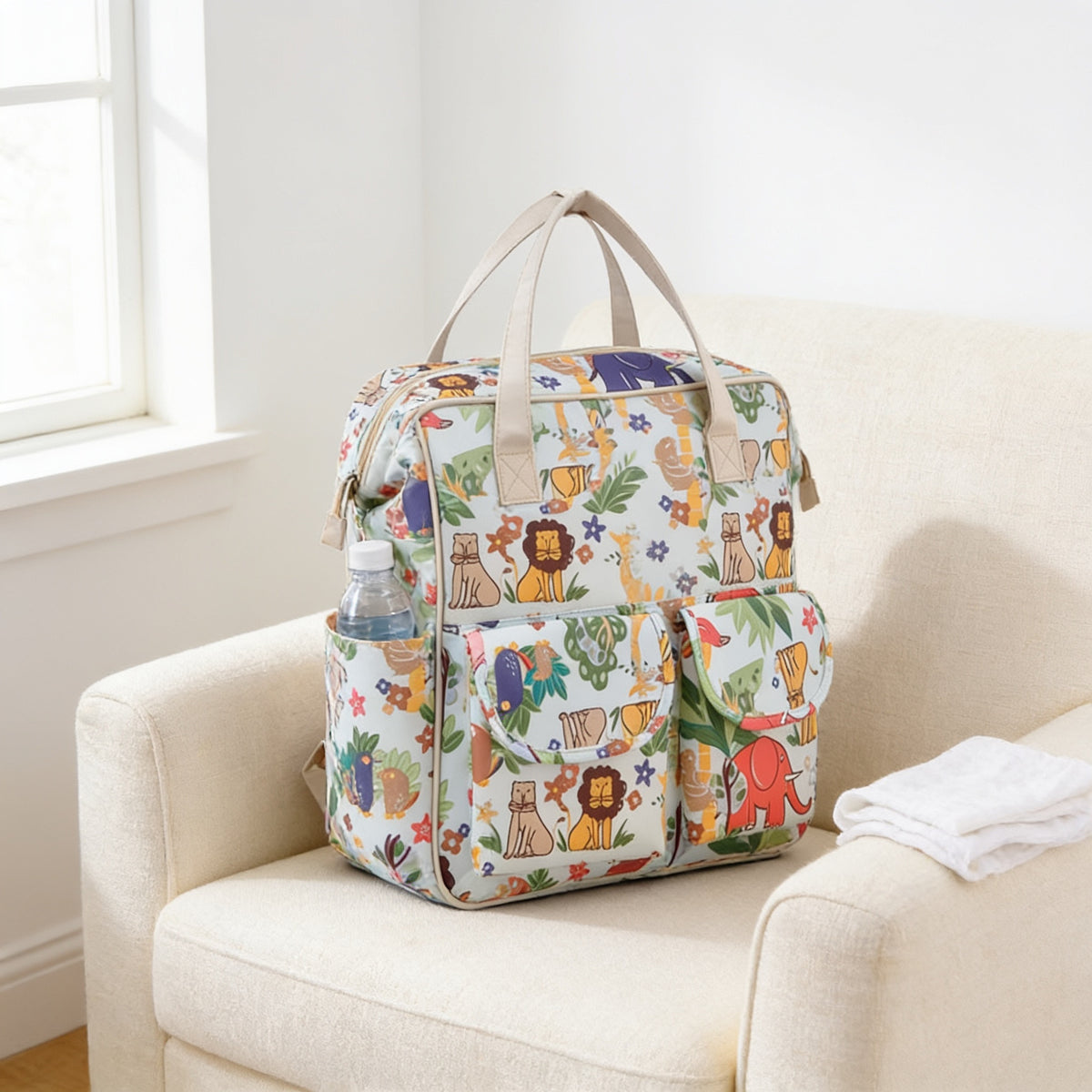 Lumiwee Lark diaper messenger bag, Animal Style option, in a bright room