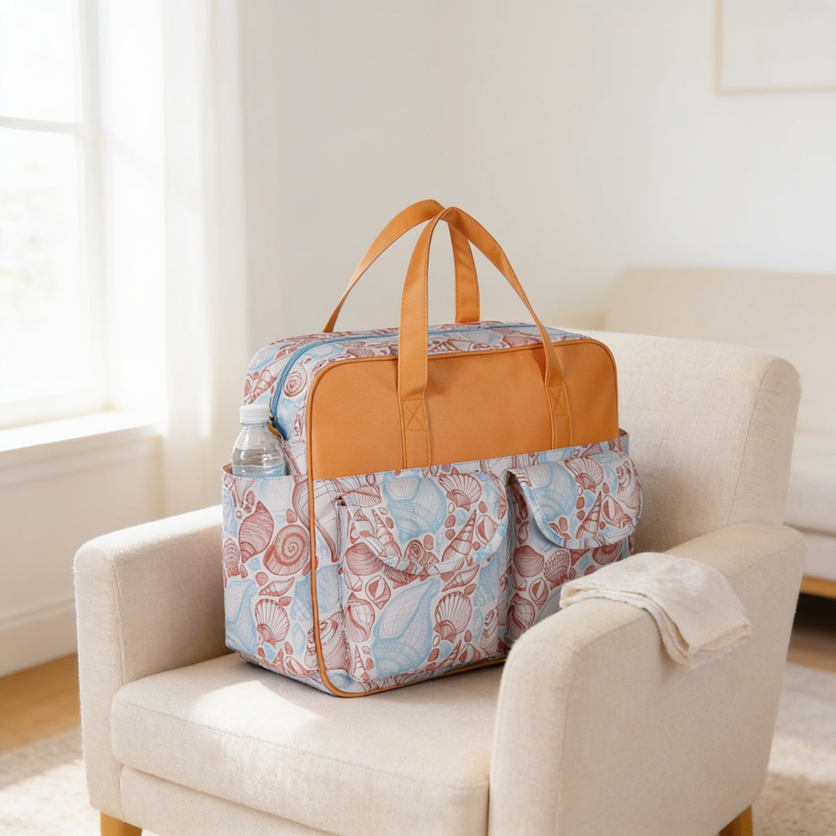 Lumiwee Lark diaper messenger bag, Conch option, in a bright room