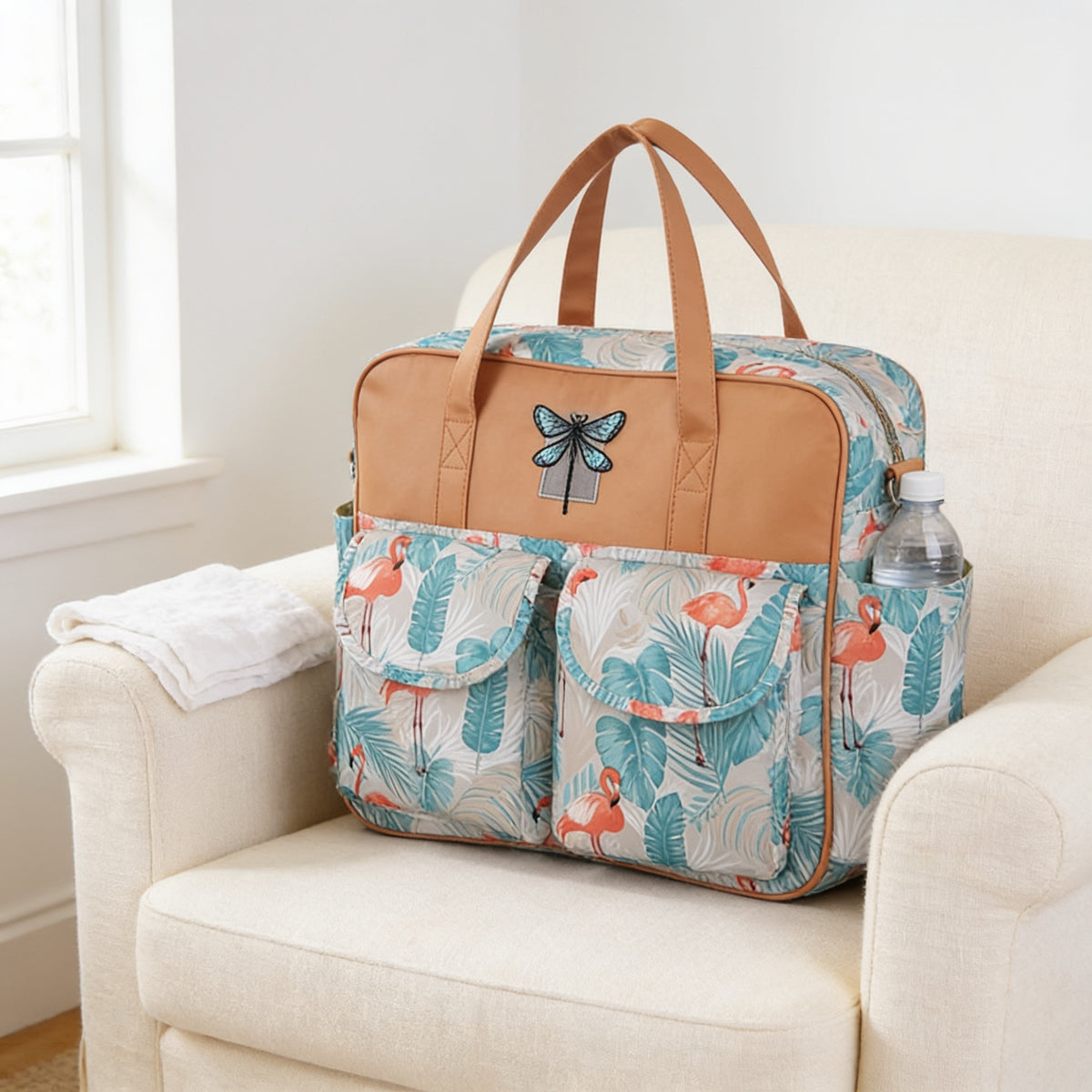 Lumiwee Lark diaper messenger bag, Flamingo option, in a bright room