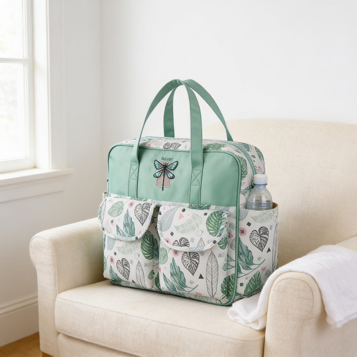 Lumiwee Lark diaper messenger bag, Leaf option, in a bright room