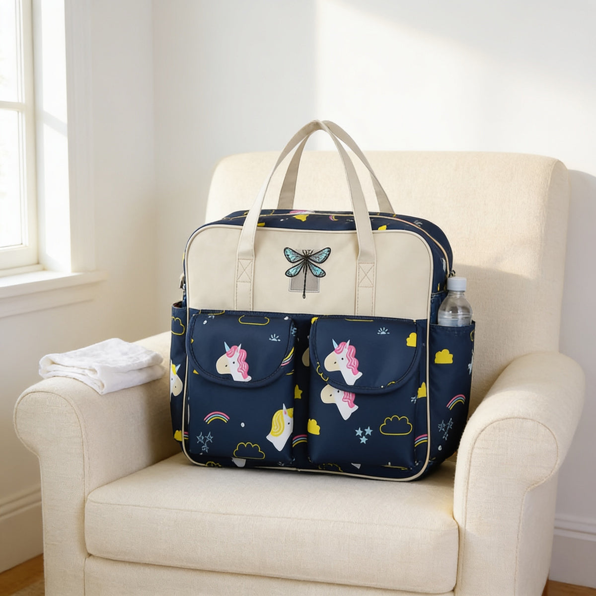 Lumiwee Lark diaper messenger bag, Rainbow Unicorn option, in a bright room
