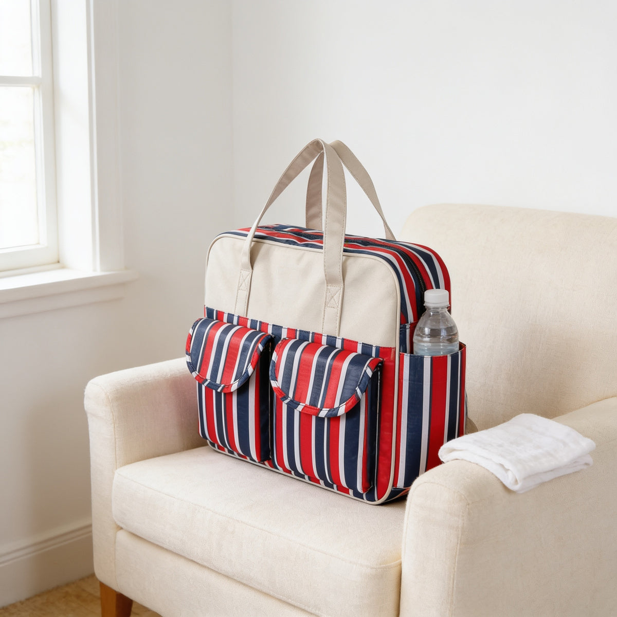 Lumiwee Lark diaper messenger bag, Red Stripes option, in a bright room
