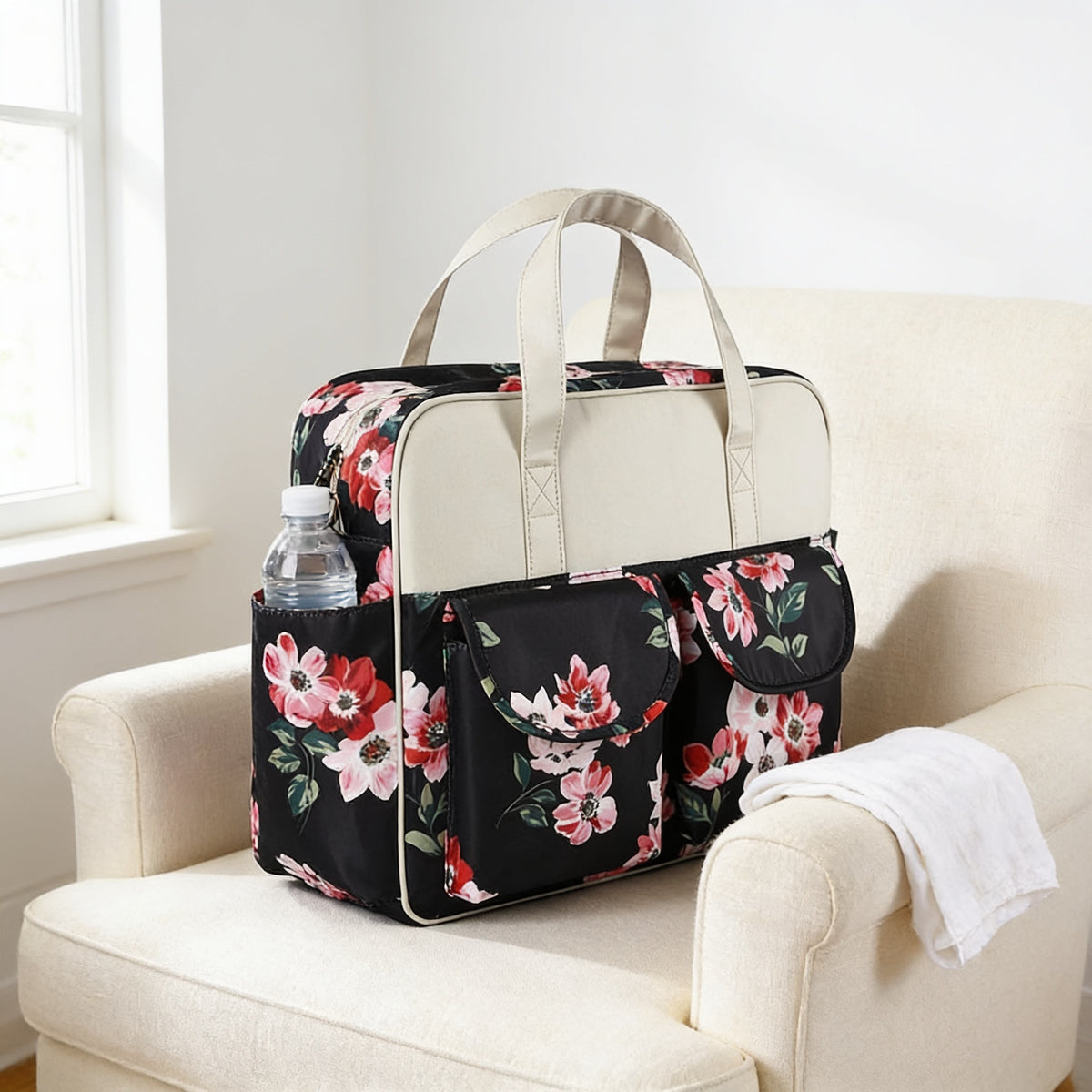 Lumiwee Lark diaper messenger bag, Rose Painting option, in a bright room