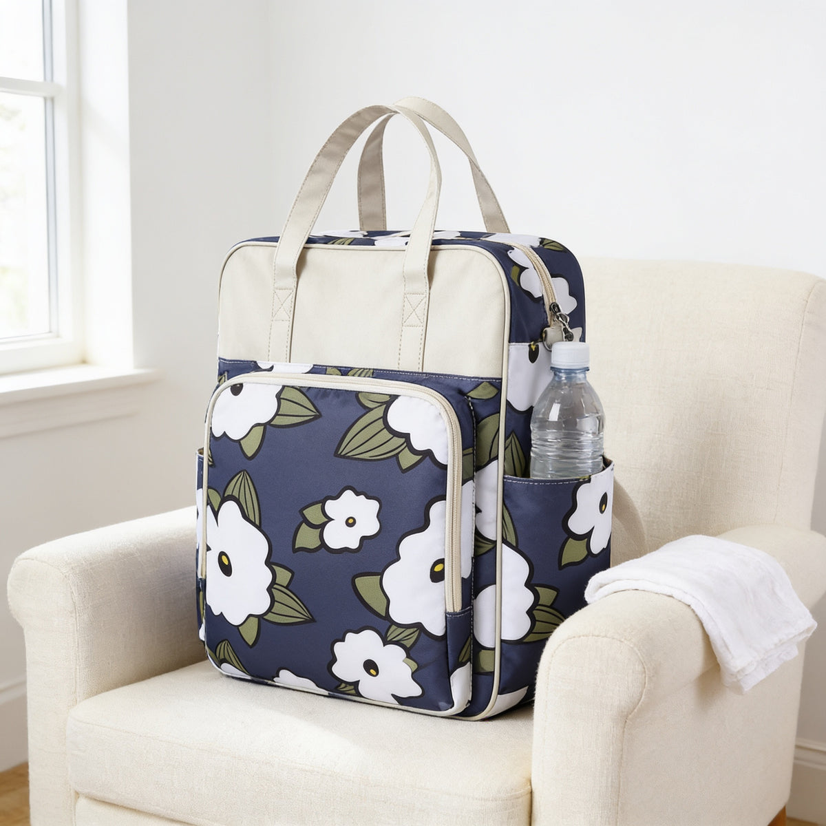 Lumiwee Lark diaper messenger bag, Summer Iris option, in a bright room
