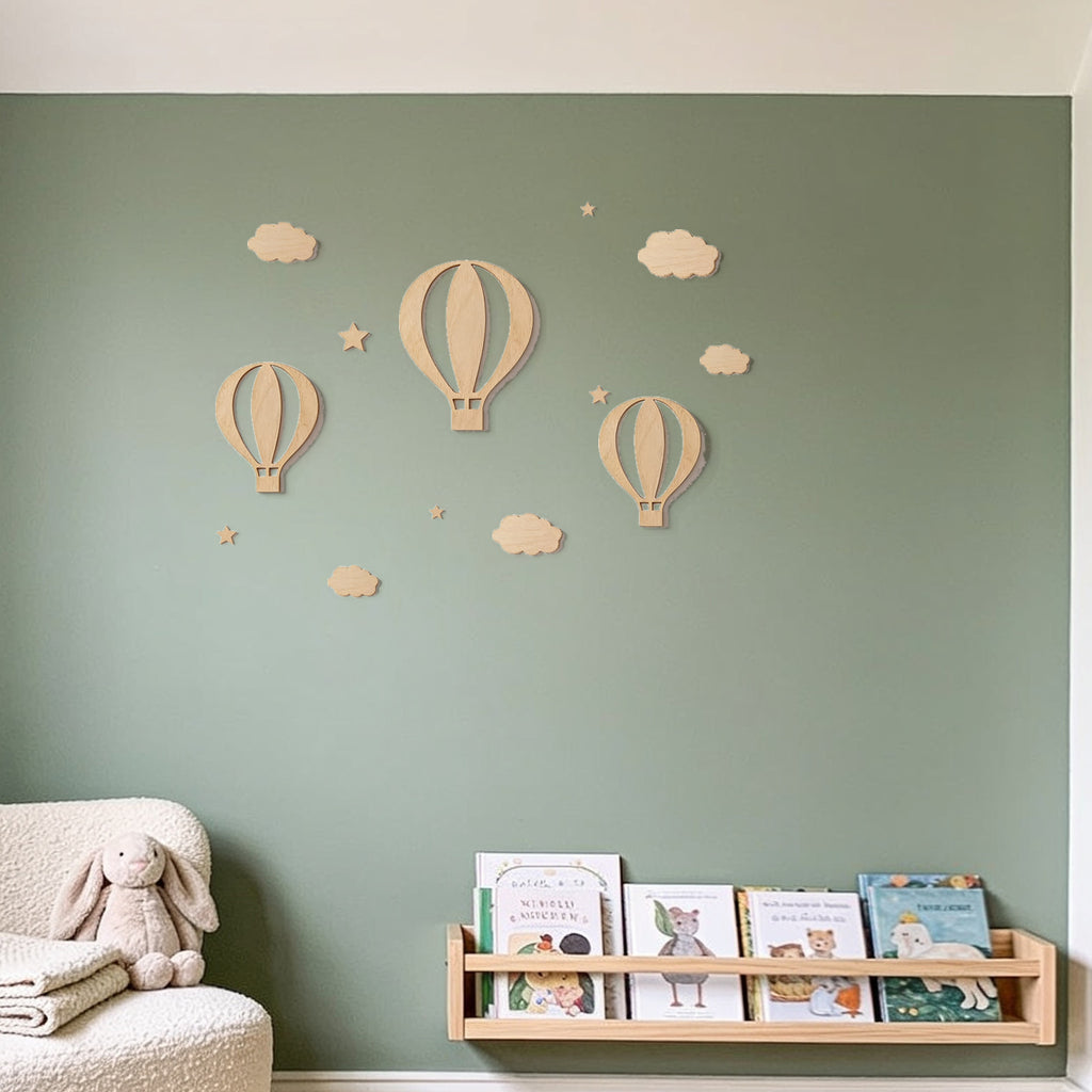 Lumiwee Lofty wooden hot air balloon wall decor: the wooden sky set on a sage wall above a reading corner