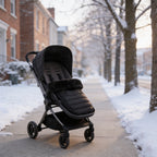 Lumiwee Mitten stroller bunting bag: footmuff in a stroller on a snowy sidewalk