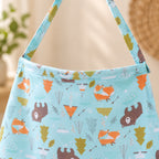 Close-up of the nursing cover's curved neckline and matching neck strap
