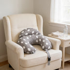 Lumiwee Nursing pillow with adjustable strap: gray cloud print nursing pillow on a glider chair