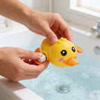Lumiwee Paddle wind-up bath toy: winding the duck toy