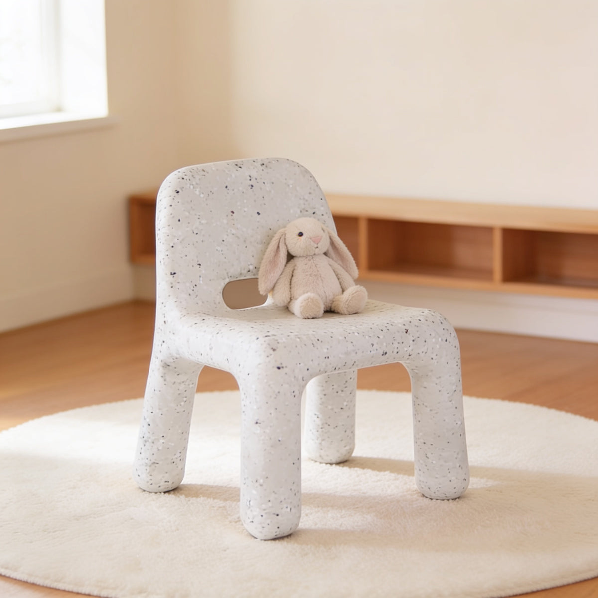 Lumiwee Pebble kids table and chair set, Chair Only – Black Speckle option, in a bright room