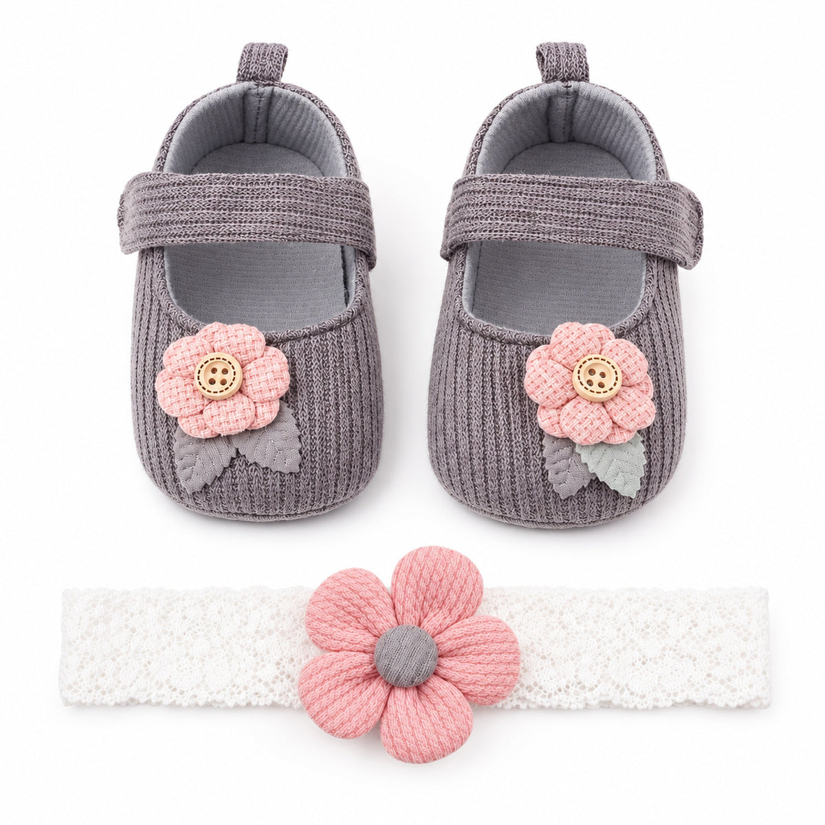 Gray button-flower baby shoes with one headband on a white background