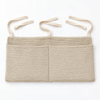 One organizer laid flat with its three pairs of fabric ties