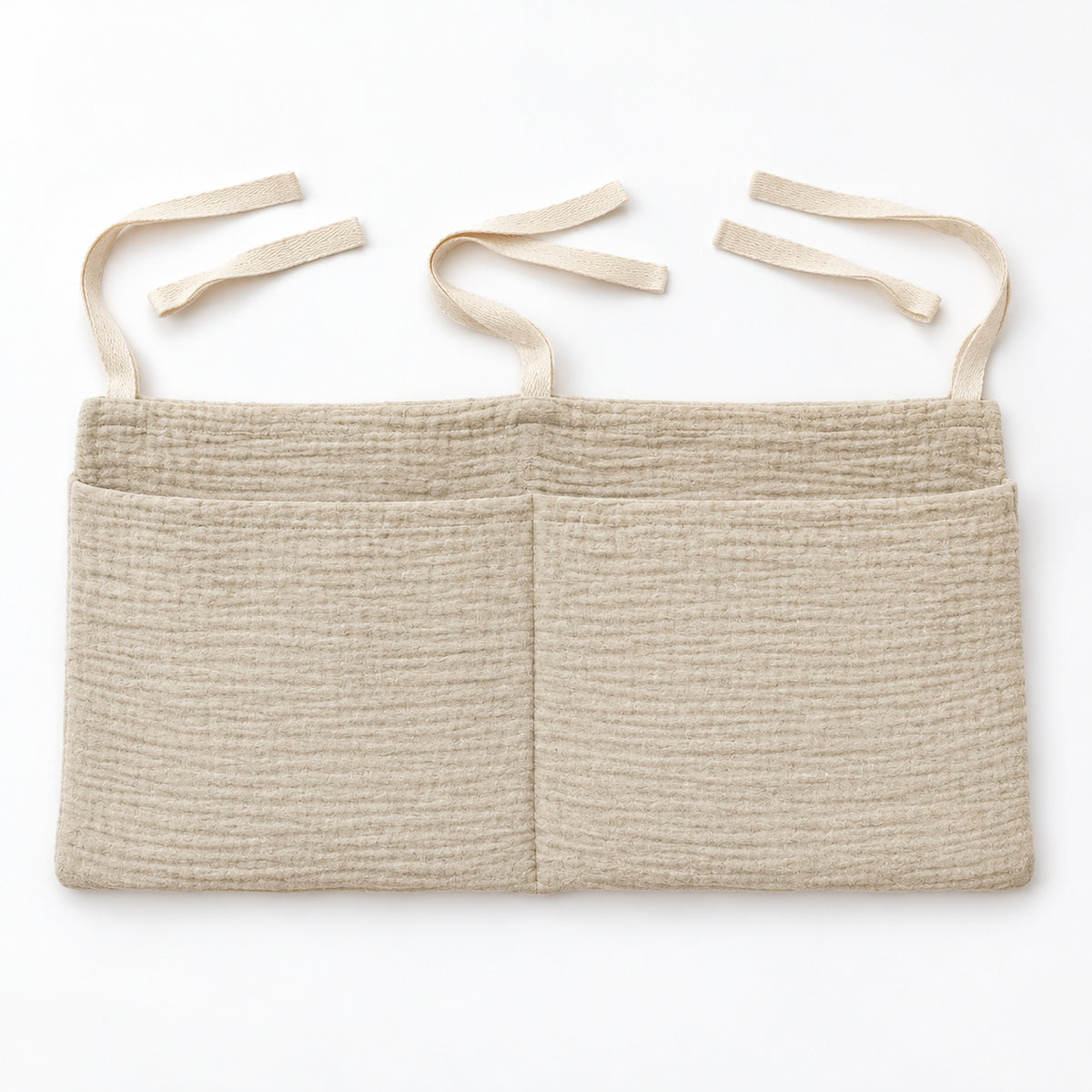 One organizer laid flat with its three pairs of fabric ties