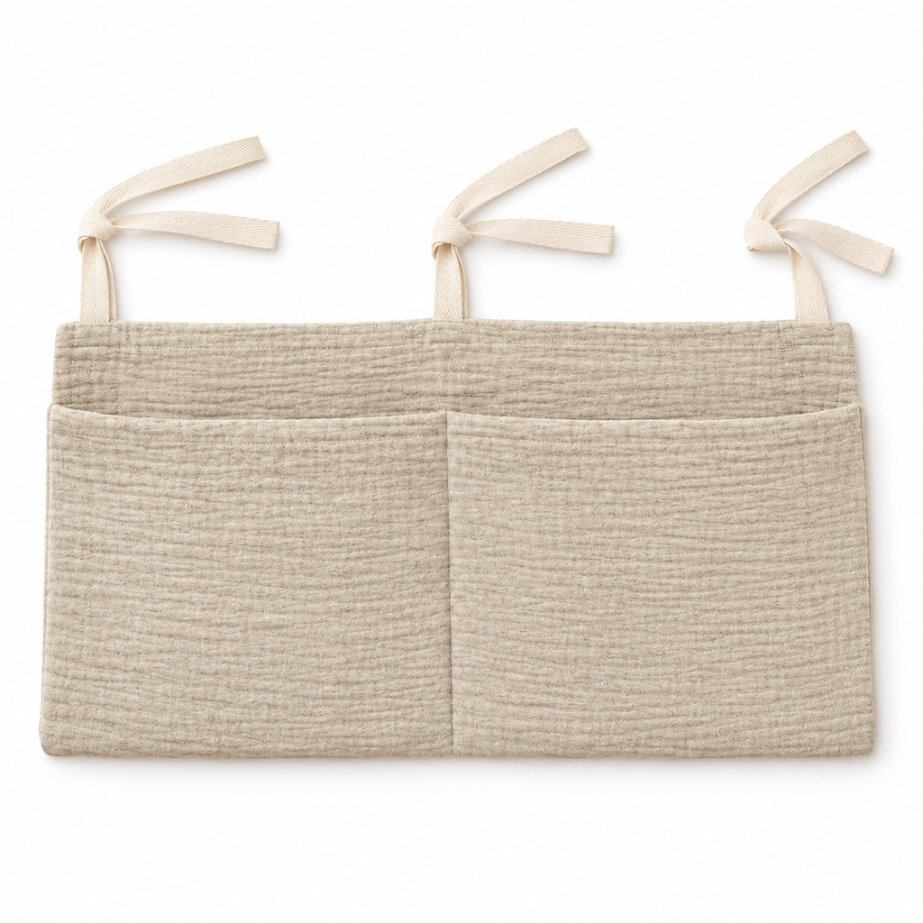 Khaki two-pocket hanging organizer alone on white