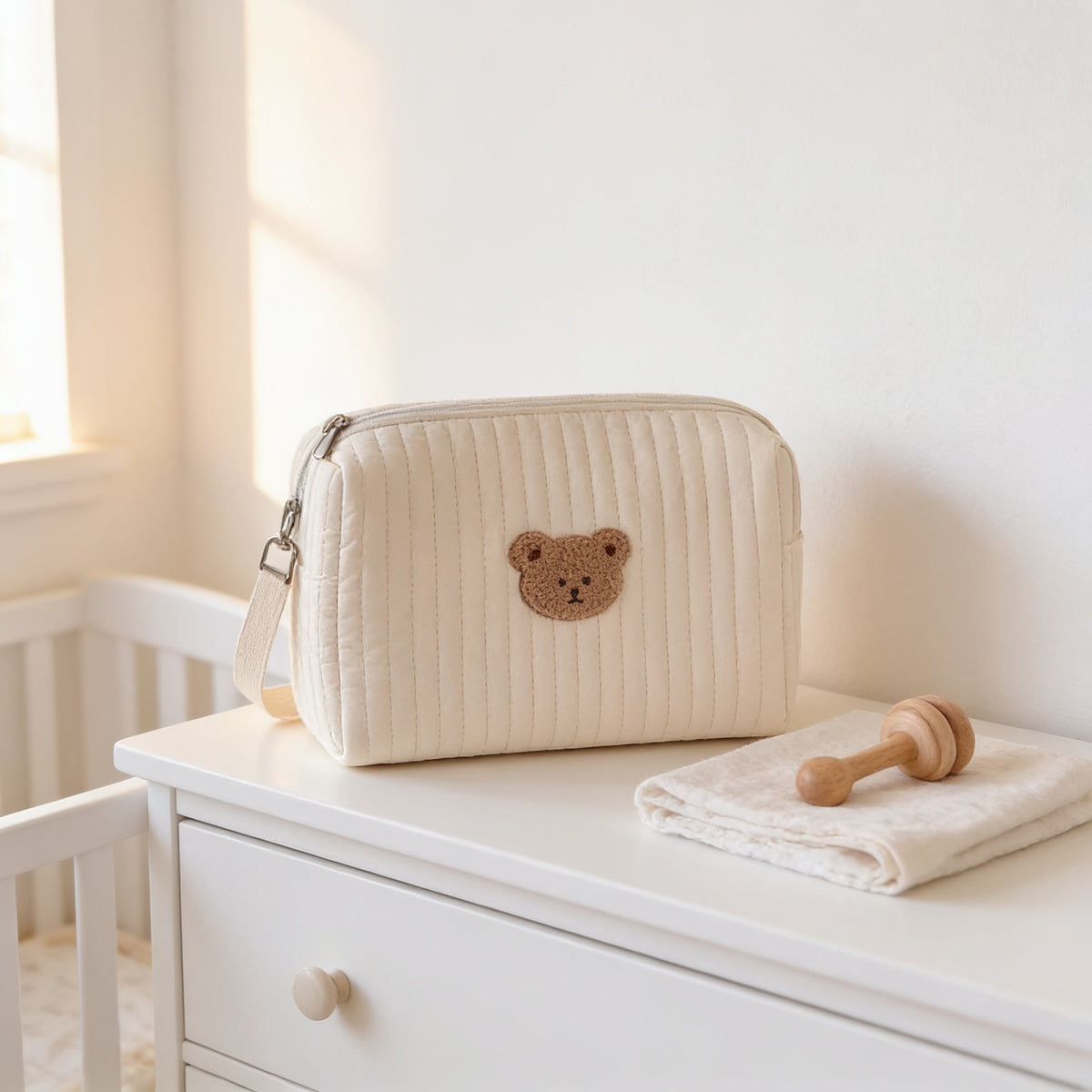 Lumiwee Posy embroidered diaper pouch, Single Bear option, in a bright room