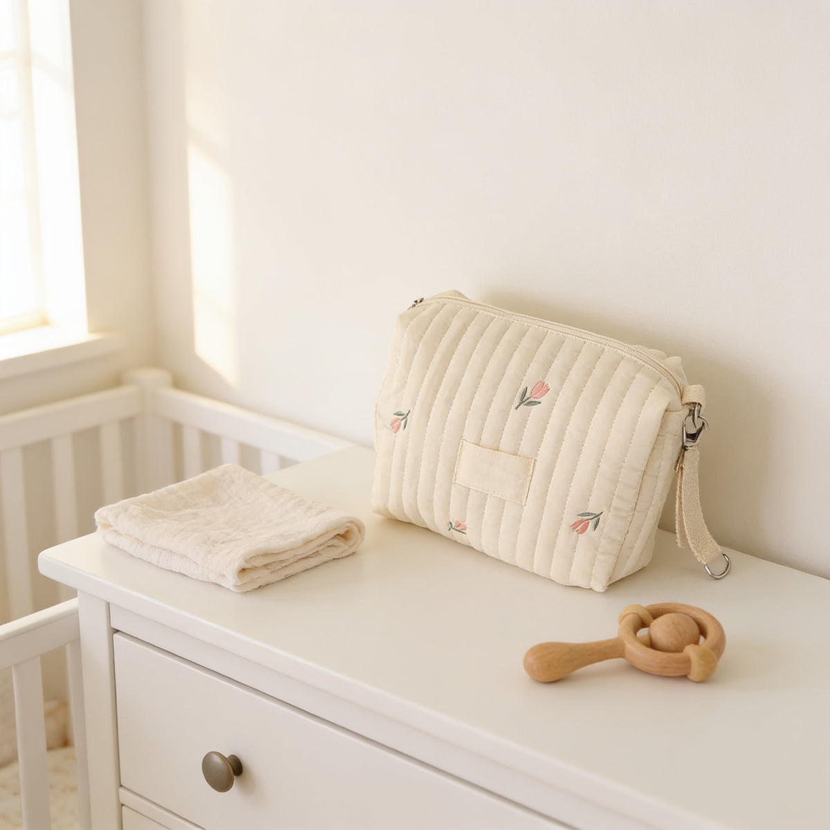 Lumiwee Posy embroidered diaper pouch, Tulips option, in a bright room
