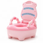 Pink potty chair with open lid alone on white